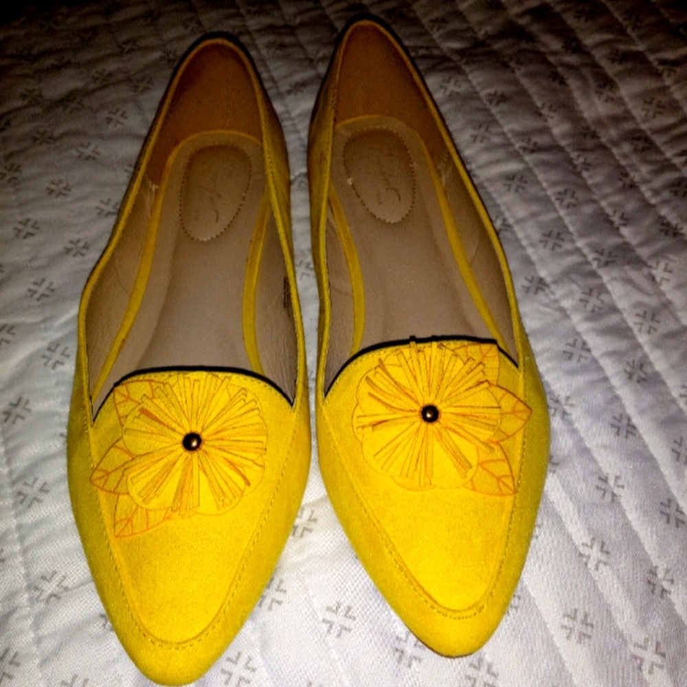 Yellow faux suede flats with cushioned insole